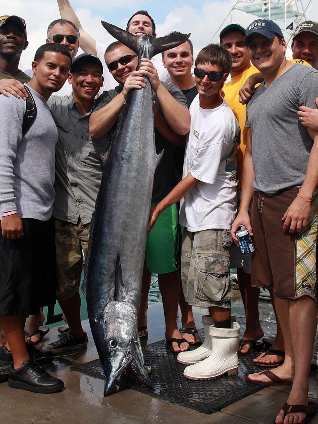 Group of anglers with a large wahoo caught offshore out of Miami